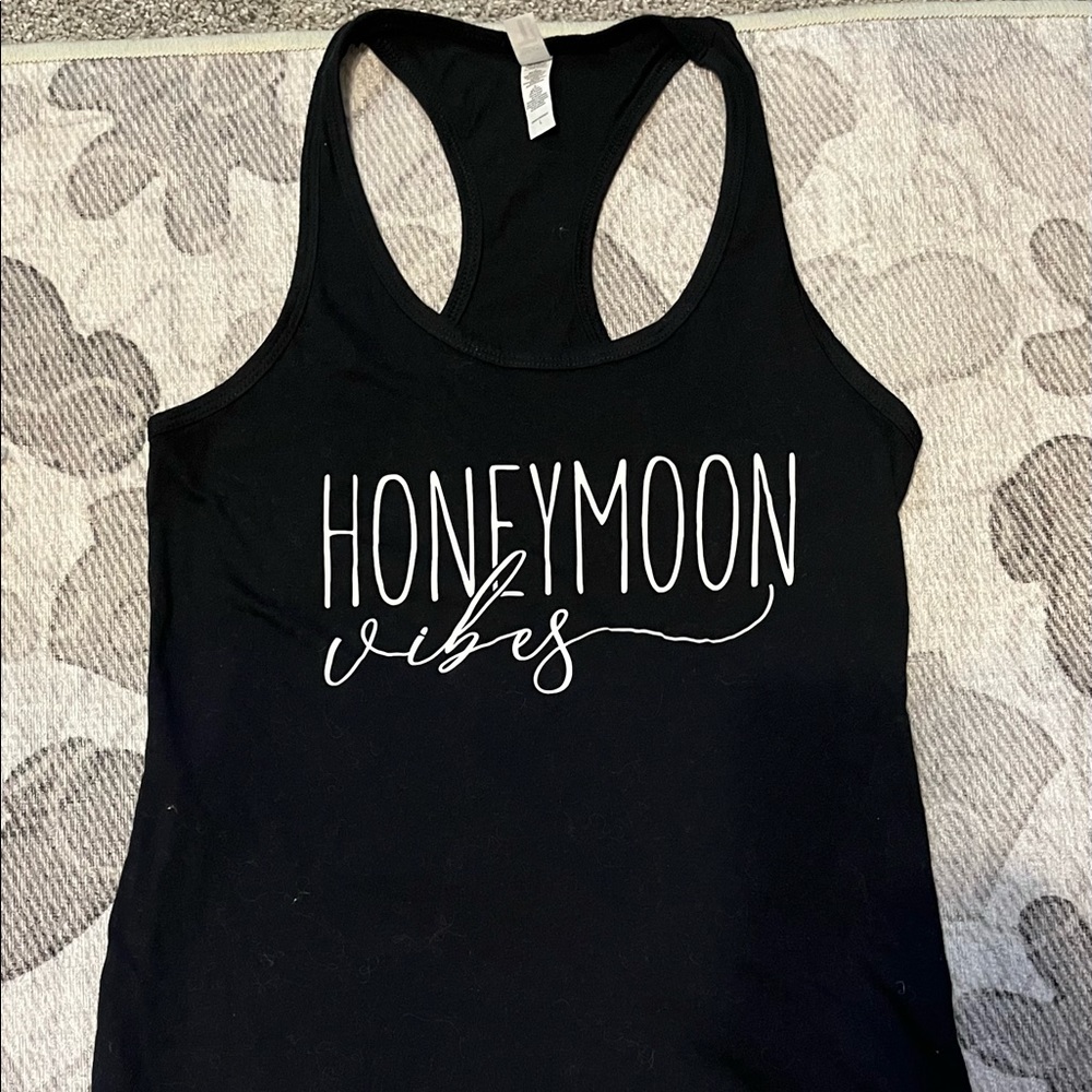 His and hers “Honeymoon vibes” tank tops